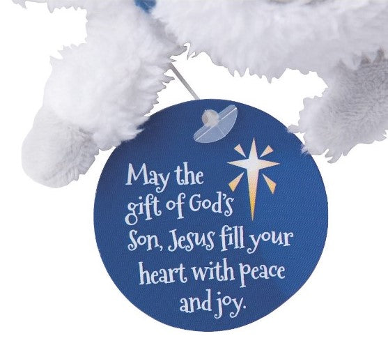 meaningful christmas message with lamb of God plush toy